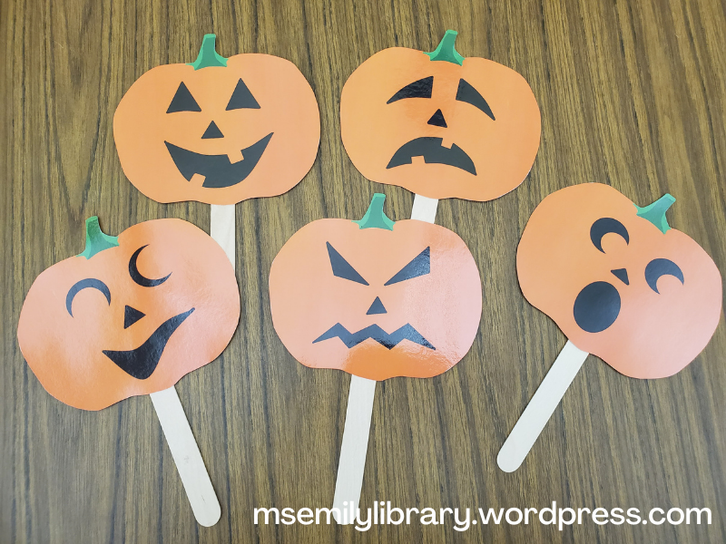 five jack o lanterns printed and laminated and mounted on jumbo craft sticks. They show a happy, sad, surprised, angry, and silly face.