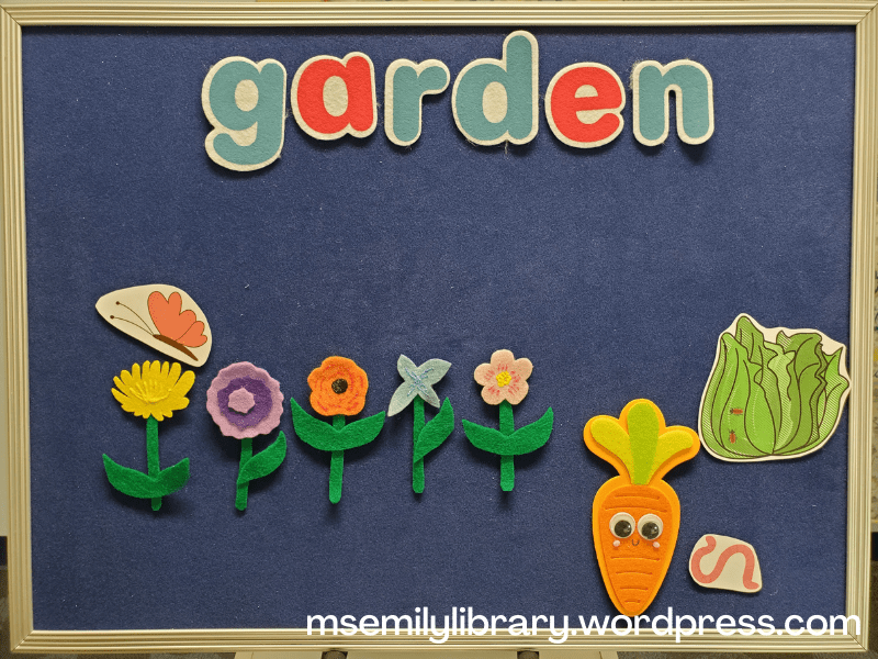 Garden tableau: the word garden spelled at the top, five flowers, butterfly, carrot, worm, and lettuce leaf.