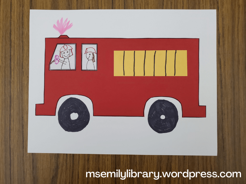 Picture of fire truck craft, with a yellow ladder.  siren light is drawn with pink highlighter, wheels are drawn in black marker, and two firefighters are drawn on the white windows.