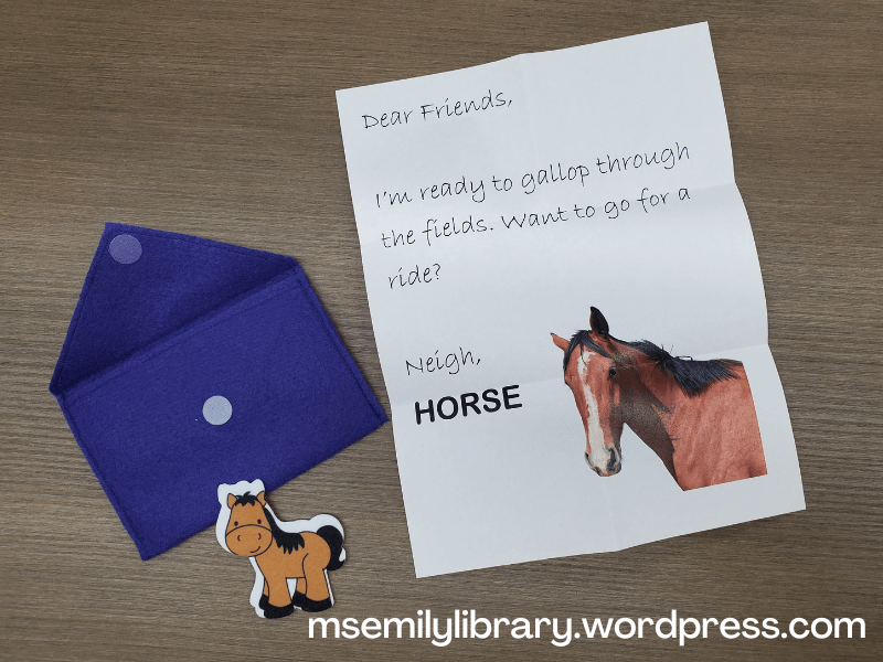 Picture of the open felt envelope, the letter from horse (including a photograph of a horse) and the horse felt piece.
