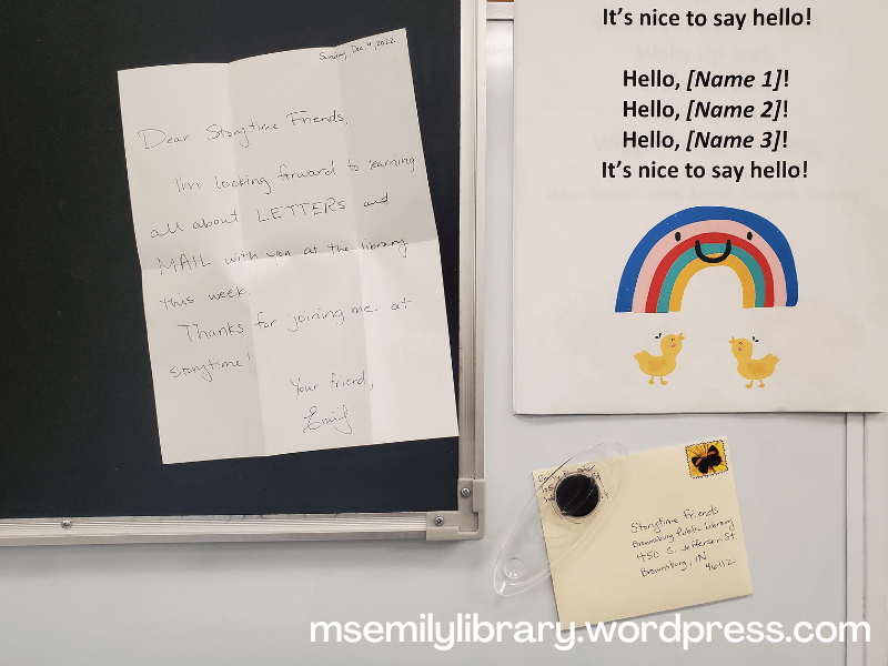 Photo of storytime easel with envelope addressed to "Storytime Friends" held on with a magnet, and the letter inside shown to the side. Also visible is the lyrics sheet for Hello Friends.