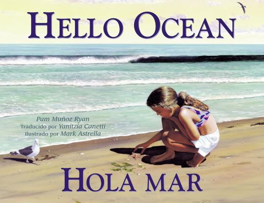 Hello Ocean/ Hola Mar book cover, showing a girl kneeling and examining a beach with the surf just behind her