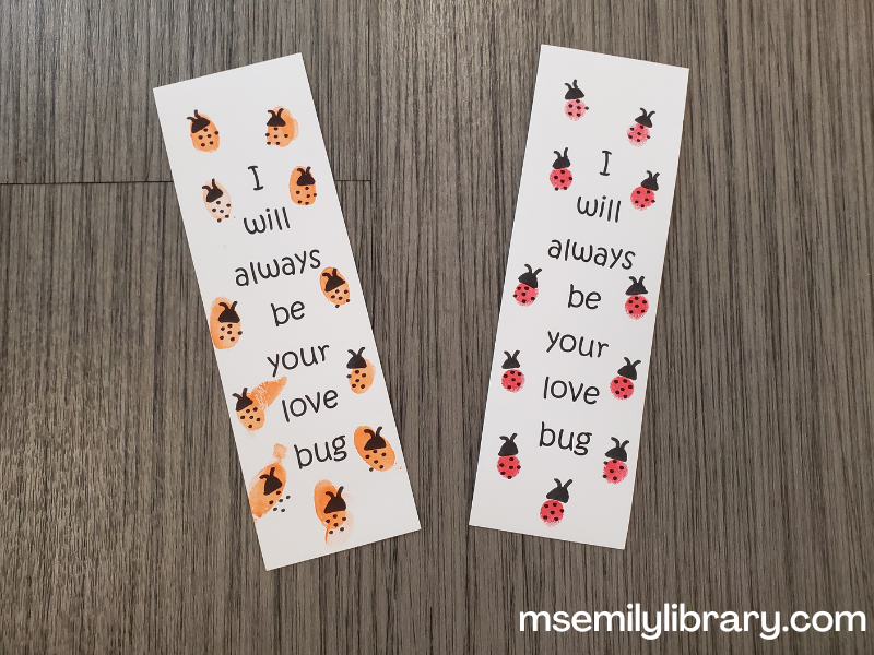 love bug bookmark, one with red stamped ladybugs and one with orange. each says "I will always be your love bug"